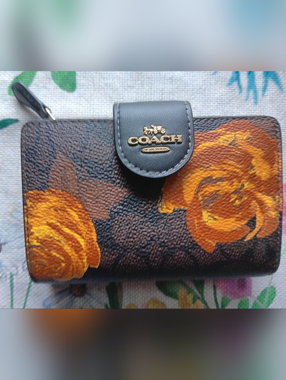 COACH Brown Signature Floral Wallet with Gold Logo